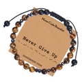 Detail view of Morse Code bracelet with tiger eye beads on kraft card for motivation - Never Give Up
