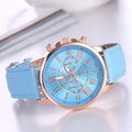Detail view of the sky blue watch face with Roman numerals and decorative subdials - Light Blue