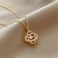 Elegant gold titanium necklace with interlocking rings and sparkling zircon stone - Titanium Steel Gold Style (X618)