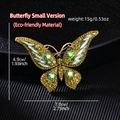 Macro shot of green crystal butterfly brooch with golden alloy base and detailed dimensions - Small Butterfly Green (KC0258)