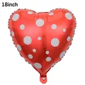 Detail of 18 inch red heart-shaped foil balloon with white polka dots for Valentine's Day - 18 Inch Valentine's Heart Red with White Polka Dots