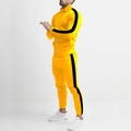Side view of men's slim fit yellow tracksuit with black stripes and stand-up collar - Yellow Black Patchwork