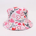 White bucket hat with pink hearts and black Eiffel Tower prints for sun protection - White Heart Eiffel Tower Style