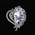 Elegant silver alloy heart brooch with sparkling teardrop crystal and hollow pattern - MM-BR-0026 / Silver