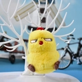 Macro detailed view of yellow frowny chicken plush keychain hanging on white branch - Wobi Chicken / 12cm
