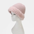 Detail of pink knitted winter hat featuring thick yarn and soft faux fur brim on mannequin - Plain / Pink