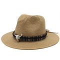 Detail of western straw hat featuring ethnic patterned band and silver bull skull ornament - Khaki