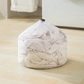 Large white fine mesh laundry bag with drawstring lock containing knitted clothing - Coarse Mesh 25*30