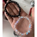 Magnetic couple bracelets with black matte beads, iridescent beads, and crown charms - Moonlight Matte Crown