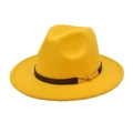 Detail of a bright yellow fedora hat with a black faux leather band and gold buckle - Yellow
