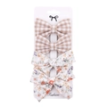 Detail of four fabric bow hair clips with brown plaid and floral patterns on card - DP037-7 (4pcs Set: Light Brown Plaid/White Floral)