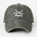 Detailed view of Cat Mom embroidery on a washed dark gray cotton baseball cap - Army Green