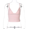 Close-up of pink ruched cropped camisole top featuring soft elastic fabric texture - XS / Pink