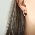 French style U-shaped titanium steel earrings with tiger eye stone on model side view - Steel Color Tiger's Eye Earrings