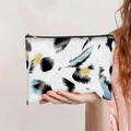 Close-up of leopard print canvas bag with silver zipper held in hand by a model - Modern Abstract Blue Leopard Style (jiayingpbb0146)