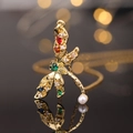 Golden dragonfly pendant necklace with colorful gemstones and a white pearl accent - Style U-Gold Multicolor Gemstone Pearl