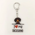 Detail of acrylic keychain featuring dachshund dog illustration and silver metal ring clasp - Dachshund Style (19)