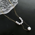 Double-layered gold-finish titanium steel necklace with white faux pearls and gold chain - 03-K22 Double Layer Shell Pearl Necklace Gold