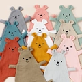 Macro shot of assorted colors muslin cotton bear comforter towels for babies - Custom Color