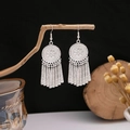 Ethnic style silver earrings featuring sun flower patterns and long metallic tassels - Silver Sunflower Hollow Cylindrical Tassel Style (E1606-2)