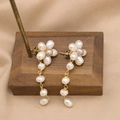 Baroque pearl tassel earrings with white and purple flower design on golden metal studs - Flower Drop Earrings