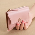Pink faux leather short wallet with cloud stitching, gold flower charm and gold zipper - Pink