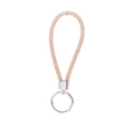 Close-up of elegant rose gold rhinestone loop keychain with silver metal hardware - Nude