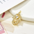 Detail of Hamsa Hand pendant with a large heart zircon and pavé crystal edges - White Zirconia