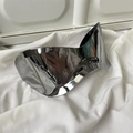 Detail view of futuristic silver mirrored cycling sunglasses on white wrinkled fabric - Large Punk Mercury Color