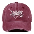 Detail of distressed burgundy baseball cap featuring white gothic letter embroidery - Burgundy