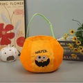 Plush orange Halloween pumpkin basket with green handle and Harper name embroidery - Medium Harper Ghost Face