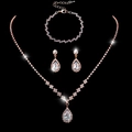Elegant rose gold bridal jewelry set featuring teardrop crystals and sparkling rhinestones - 463+785 3-Piece Set / Rose Gold