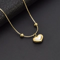 Collar de corazón de oro K con incrustación de nácar blanco y cuentas doradas sobre negro - Dorado