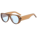 Fashionable oval sunglasses with brown frames and blue lenses in a 45-degree side view - Transparent Brown/Blue