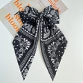 Large retro paisley print bow hair clip with long streamers for elegant women's styling - Black Paisley Print Ribbon