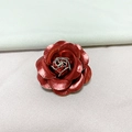 Elegant red leather-textured camellia brooch with golden details and layered petals - Burgundy