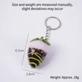 Pale pink artificial strawberry pendant with chocolate coating and metal keychain - Dark Coffee Jam - White Strawberry (Keychain)