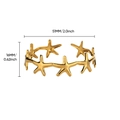 Detailed close-up of a gold starfish cuff bracelet featuring hollow nautical design elements - Gold Hollow Starfish / Gold