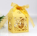 Detailed laser-cut heart and floral pattern on yellow paper favor box with ribbon - Gold