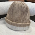 Close-up of chunky knit texture and two-tone color stitching on a warm winter beanie - One Size / Khaki/Beige Contrast