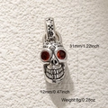 Pendentif crâne argenté avec yeux en pierre rouge et dimensions 31x12mm pour bijoux DIY - Crâne Argent Antique 2