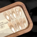 Unghie finte fatte a mano perla champagne cat-eye con trama nastro 3D e piccoli cristalli - Extra Piccolo (XS) / 2611 Appuntito Conico (Champagne Occhio di Gatto Farfalla)