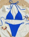 Royal blue ribbed halter bikini set with high cut bottoms displayed on woven mat - Royal Blue