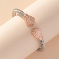 Adjustable stainless steel cable wire cuff bracelet with rose gold flower end caps - Rose Gold