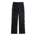 Dettaglio dei pantaloni neri con applicazioni floreali 3D e paillettes luccicanti - XS / Pants