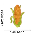 Detailed view of yellow corn embroidered patch with size markers in cm and inches - Letter I