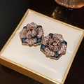 Detail of vintage flower earrings with crystal pavé petals and dark enamel accents - Silver Needle Flower Stud Earrings - Gold Blue (50#)