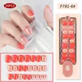 Press-on nails in coral pink with 3D golden floral patterns in a short round shape - F781-6/Square/Coral Pink Gold Flower