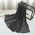 Close-up of dark grey chiffon shawl with fine stitching on a modern metal frame - 175cmx70cm / Dark Gray