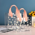 Transparent PVC gift bag with daisy print and pink fabric handles in two sizes - Pink Print / 20x18x10cm